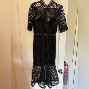 Black Bardot cocktail dress